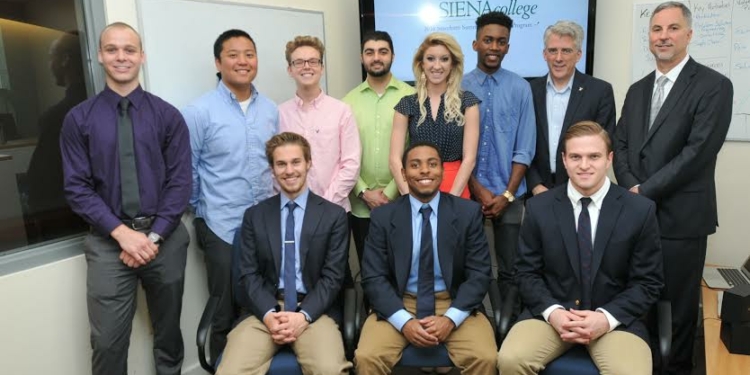 The four teams of students and their advisors, Philip Stocchetti, back row far right, and Matthew Cusack, back row, second from right. Submitted photo