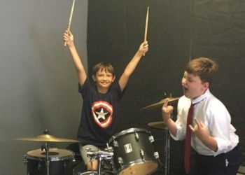 Cooper Rose, left, and Jayden Wojick, students of School of Rock in Albany, enjoy rehearsing Kassie Parisi/TheSpot518