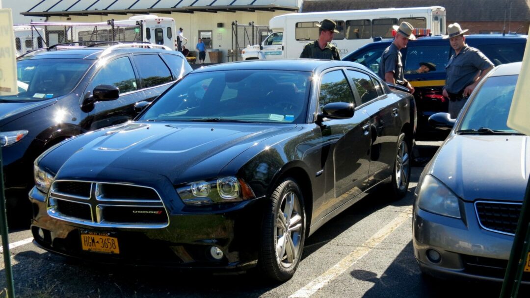 A dark colored Dodge sedan believed to have been involved earlier in a high speed chase with New York State Police was found in Albany late this afternoon. (Photo by Thomas Heffernan, Sr.)