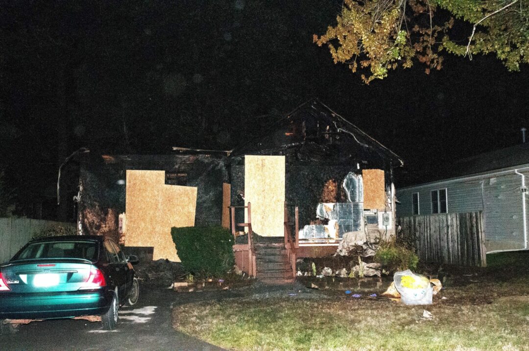 The home at 9 Sebring Ave. where a body was discovered after it was destroyed by fire. (photo by Jim Franco)