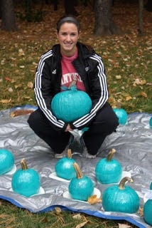 Bethlehem High School senior Lindsey Stento and her teal pumpkins