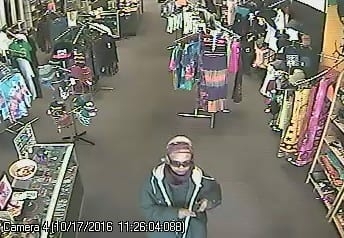 Colonie police are looking for this woman in connection with a robbery at the Deja Vu store on Wolf Road. Photo via Coloine police.