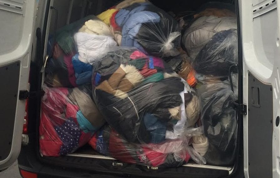 Packed, the Best Cleaners van delivers warm outerwear for those in need this winter // Photo courtesy of the office of the Albany County Executive