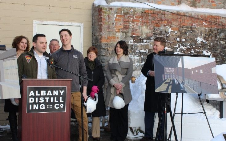 Backed by local officials and partner Rick Sicari, Albany Distilling Co. founder John Curtin speaks at the wall-breaking ceremony of 75 Livingston Avenue // Photo: Relentless Awareness