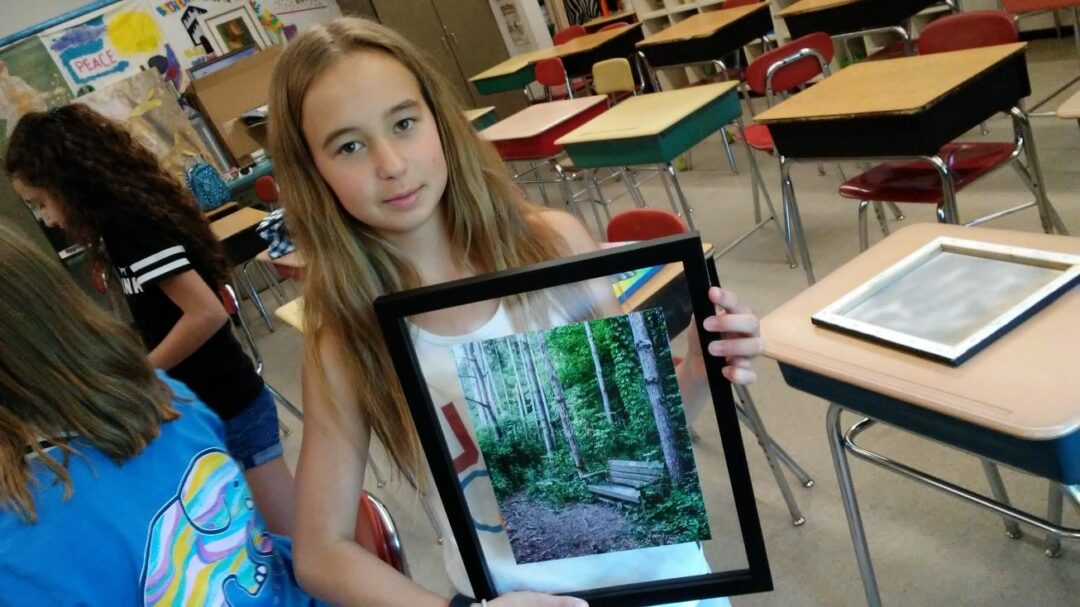 7th grader Paige Doherty has been cataloguing and framing artwork for the last two months to give other children her age the chance to get an education // Photos: W. Reilly