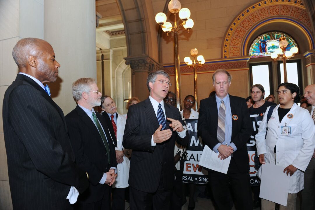 Assemblyman Phil Steck speaks at a press conference at the Capitol with Assemblyman Richard Gottfried (left of Steck) on Single Payer Healthcare. // NYS Assembly