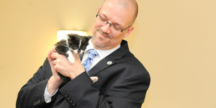 Todd Cramer and a kitten. (photo provided)