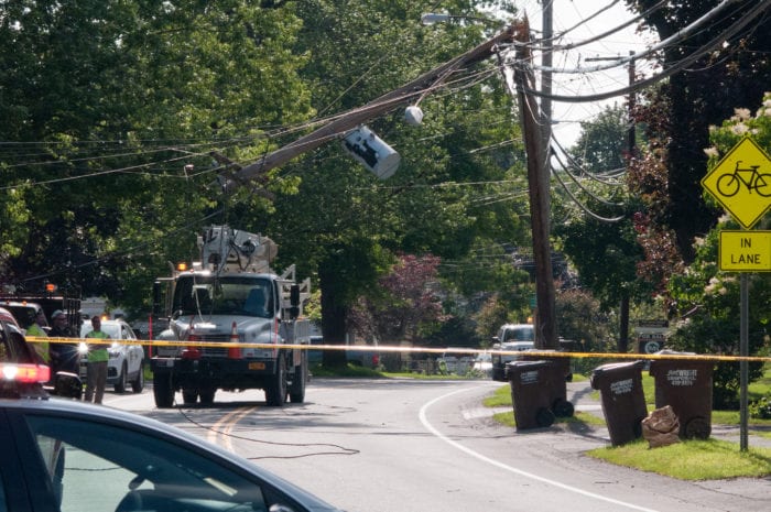Rush hour traffic was redirected from Kenwood Avenue Wednesday evening, June 28, to avoid contact with live wires. A utility pole snapped for unknown reasons, prompting the response of Elsmere and Delmar fire departments. (Photo by Michael Hallisey / Spotlight News)