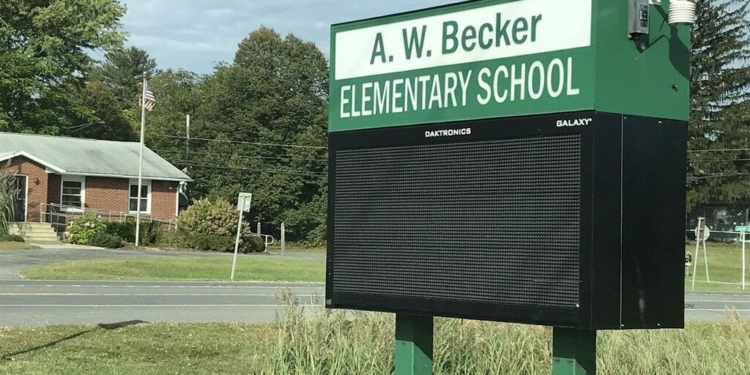 This digital sign at the entrance to A.W. Becker 
Elementary School is the subject of an ongoing lawsuit between the Town of Bethlehem and the 
Ravena-Coyemans-Selkirk Central School District. 
Kaitlin Lembo/Spotlight News