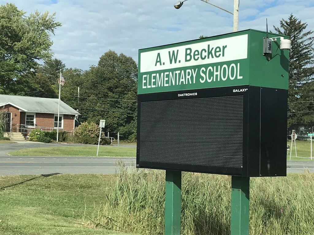 This digital sign at the entrance to A.W. Becker 
Elementary School is the subject of an ongoing lawsuit between the Town of Bethlehem and the 
Ravena-Coyemans-Selkirk Central School District. 
Kaitlin Lembo/Spotlight News