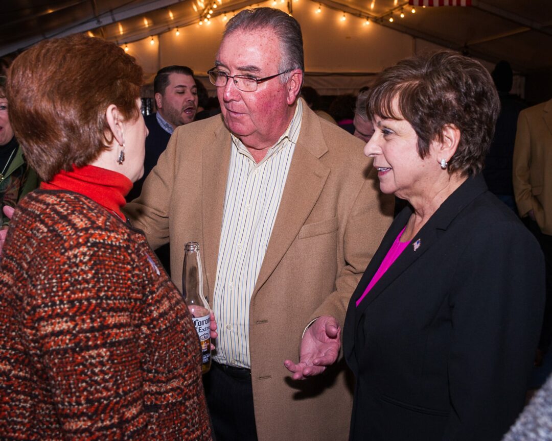 Paula Mahan and her husband Joe speak with Albany Mayor Kathy Sheehan on Election Day. (Photo by Jim Franco/Spotlight News)