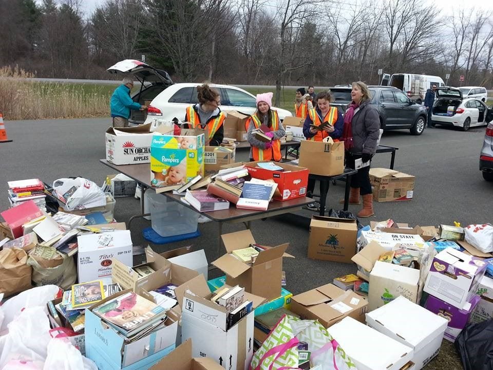 In addition to 7,560 lbs of books and cardboard gathered for recycling during the Spring Recycling event in April, Grassroot Givers and volunteers sorted out three vanloads full of high quality titles with reuse value - an estimated 3,000 lbs total  / Photo provided.