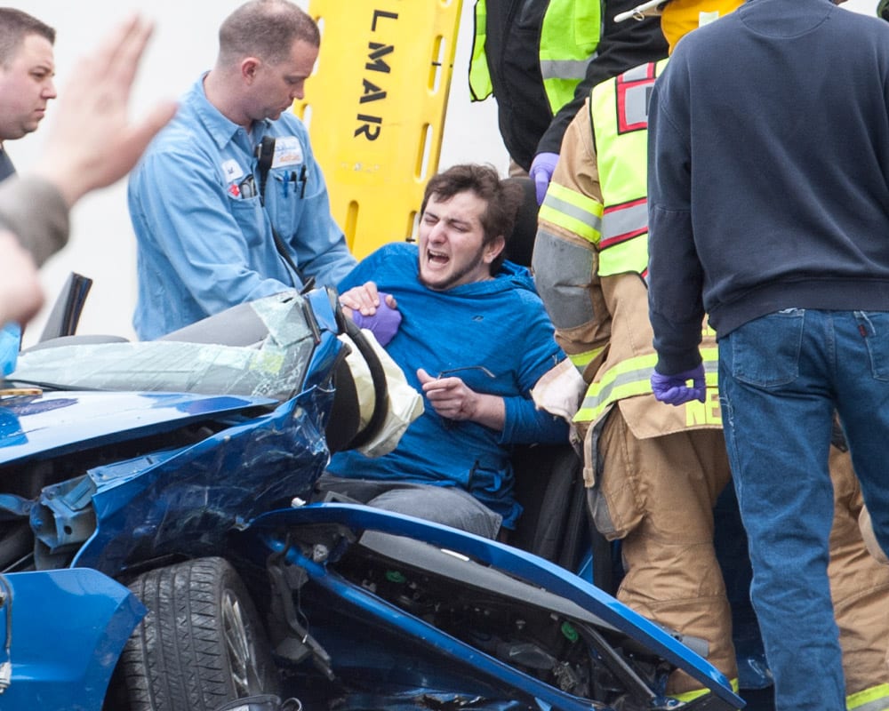 Emergency crews treat Russell Schwimmer on April 17 (Photo by Jim Franco/Spotlight News)