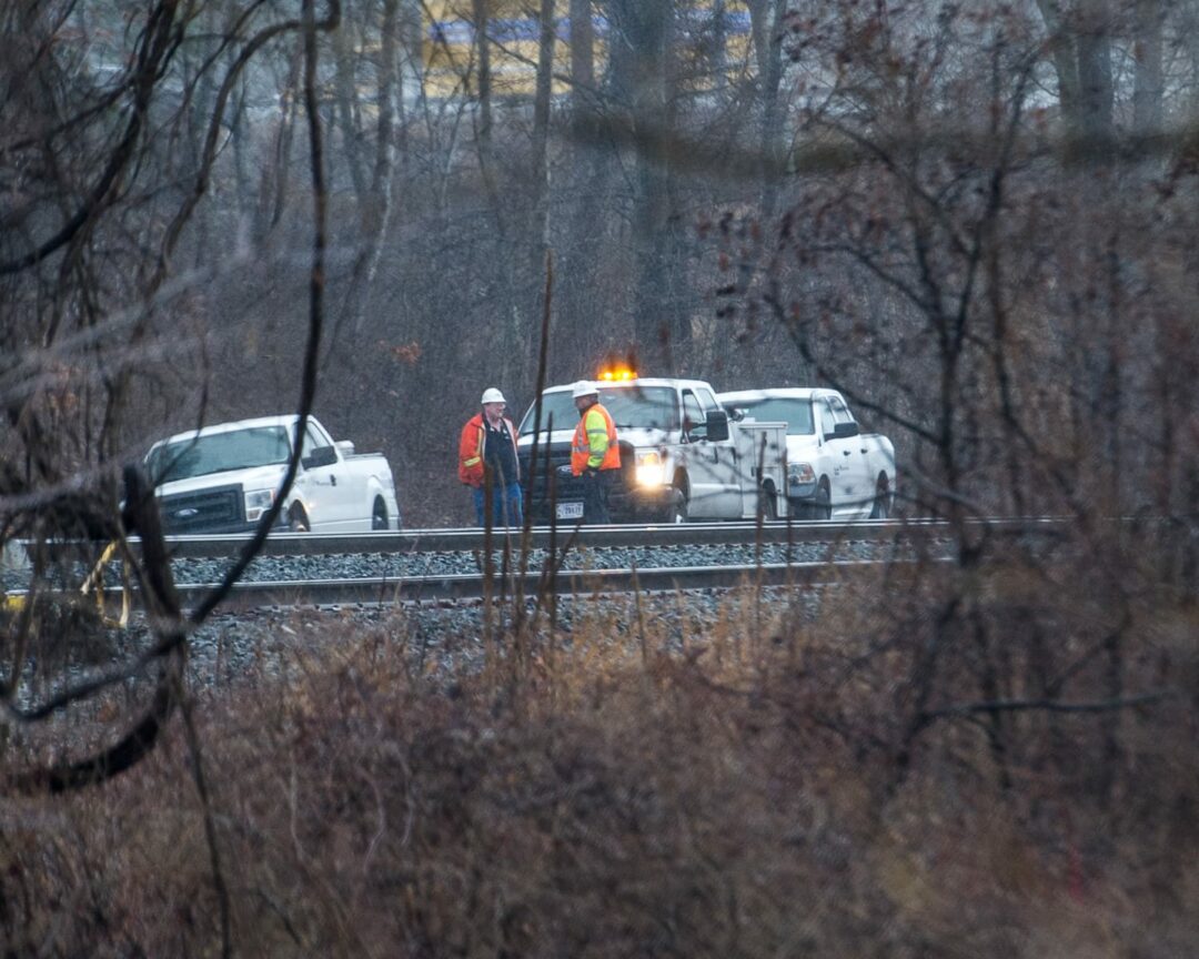 Amtrak investigators near Railroad Avenue where a man was struck and killed by a train on Wednesday, April 4. (photo by Jim Franco/Spotlight News)