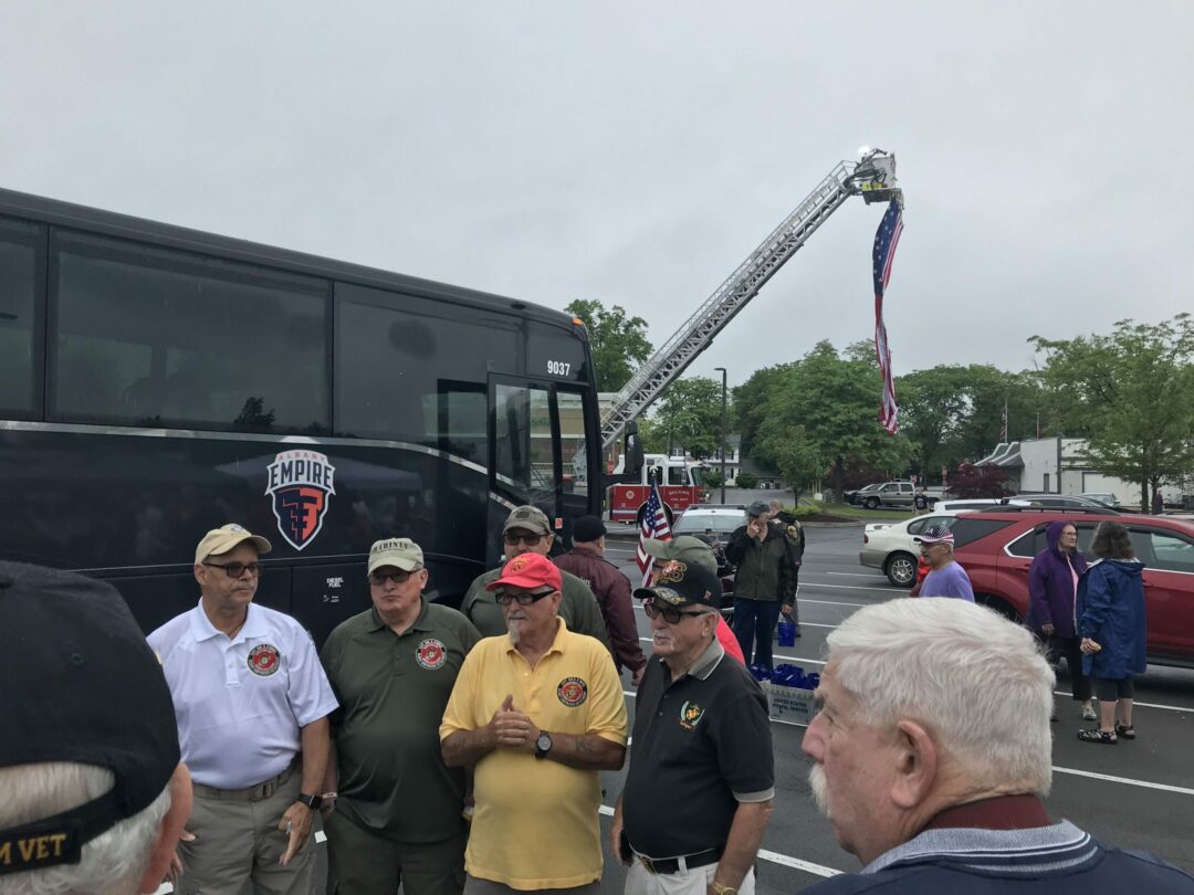 A group of local veterans gather before boarding a bus to Washington, D.C. More than 50 made the trip to the Nation’s Capital to wash the Vietnam Veterans Memorial and Korean War Monument. 
Michael Hallisey / Spotlight News