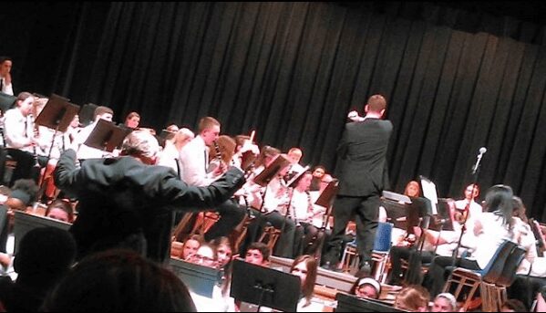 The middle and high school student bands — 180 students in all — combined to play Stravinsky’s “The Firebird” last March. Michael Hallisey / Spotlight News