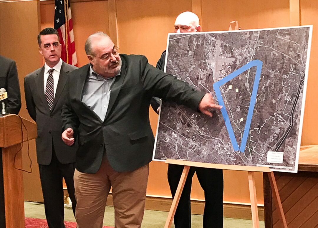 Albany County Legislator Paul Burgdorf points to an area in Colonie where 911 service is notoriously bad. Photo provided