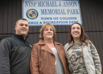 Conor, Sue and Mikala Anson at the ceremony to dedicating the park in their father/husband's name Jim Franco / Spotlight News