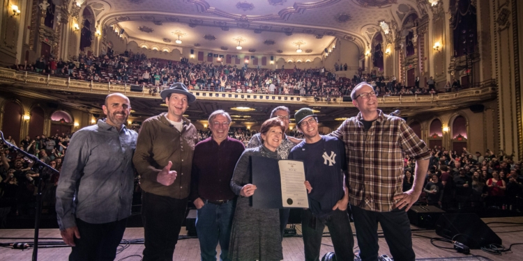 Albany Mayor Kathy Sheehan (above) stands with music promoter Greg Bell and the band moe as she proclaims feb. 24, 2018 “Moe Day.” Some of moe will come back to town to play with members of Ominous Seapods (Tom Pirozzi - left) in a show this Saturday. 

Photos by Frank Cavone and Michael Hallisey / TheSpot518