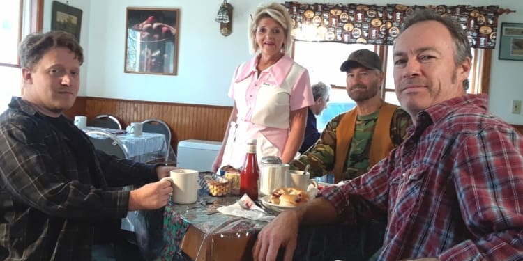 "Garrow" featured actors from upstate New York — in the same communities terrorized by Robert Garrow himself. L-R: film producer Joel Plue, actress Bunny Easter Christmas as a diner waitress, and actors Bob O'Brien and John Love as patrons.
Adirondack Films, LLC