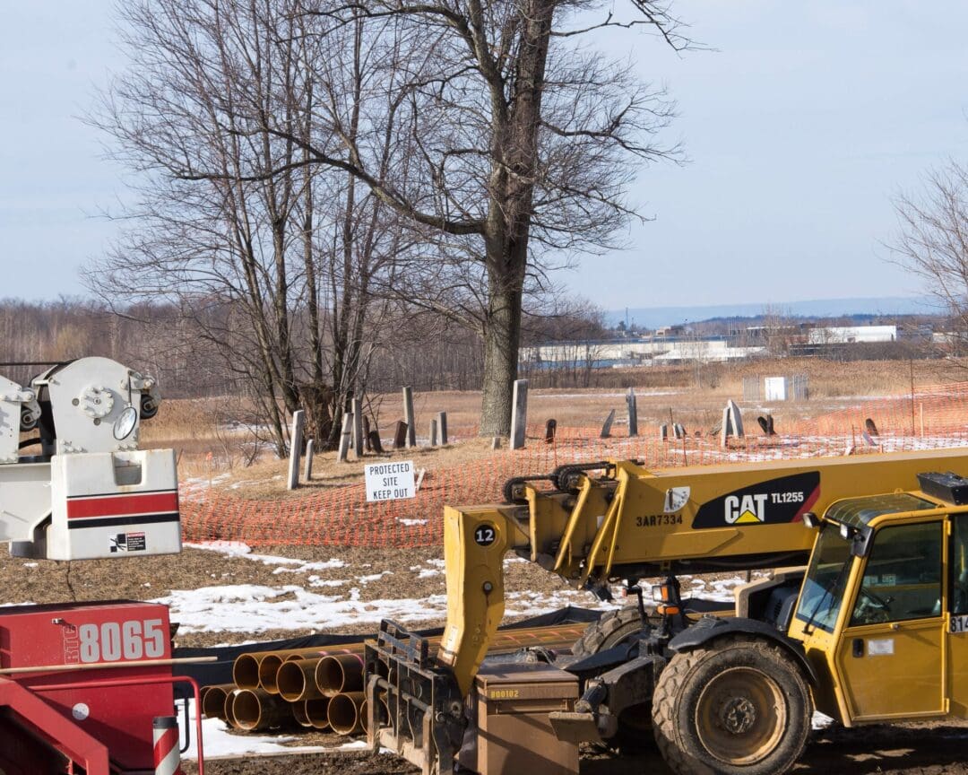 Construction machinery along the Northway with the Wolf Kemp Cemetery in the background. Jim Franco /  Spotlight Newspapers