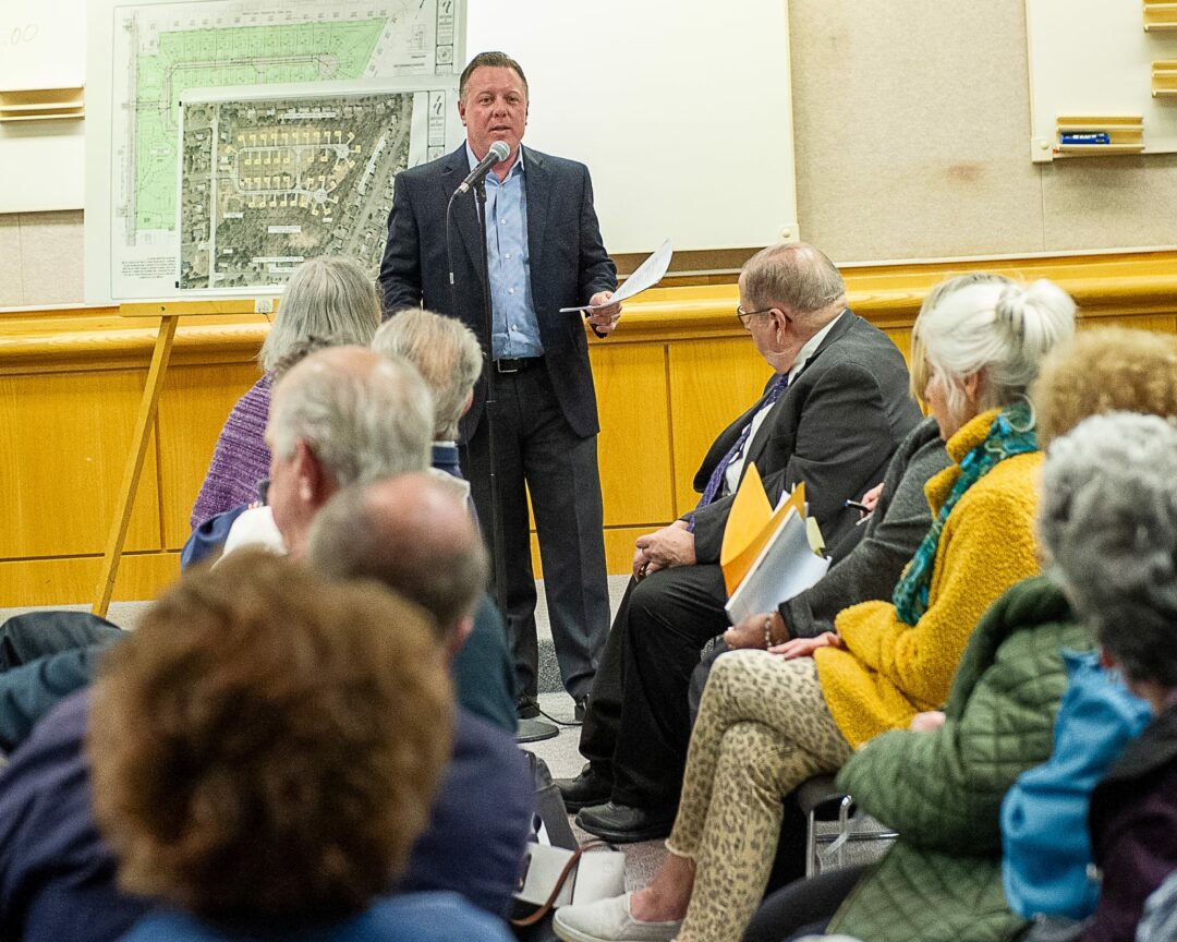 Frank Barbera, of Barbera Homes, speaks to the crowd at a Colonie Planning Board meeting on Tuesday, April 30. (Jim Franco/Spotlight News)