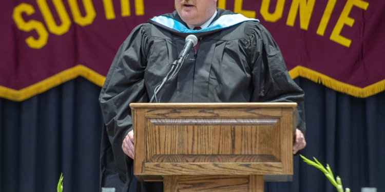 Superintendent Jonathan Buhner speaks at the Colonie High graduation in June. Jim Franco/Spotlight News