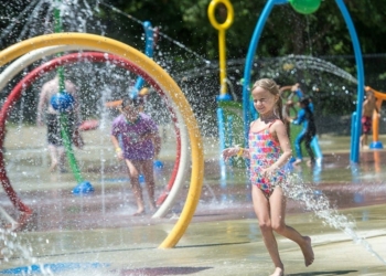 A young girl enjoys the Colonie splash pad shortly after it opened in 2018 (Jim Franco/Spotlight News)