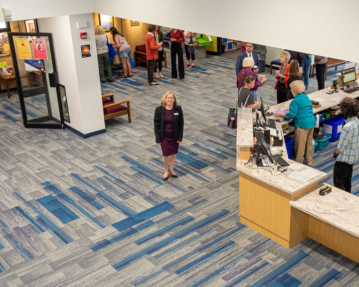 Colonie Town Library Director Evelyn Neale stands in the library’s new lobby.