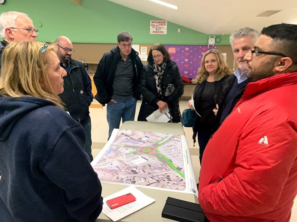 Business owners and residents asked questions about the Glenmont roundabout project and exchanged ideas for how to best stay updated about construction and traffic impact. Diego Cagara / Spotlight News