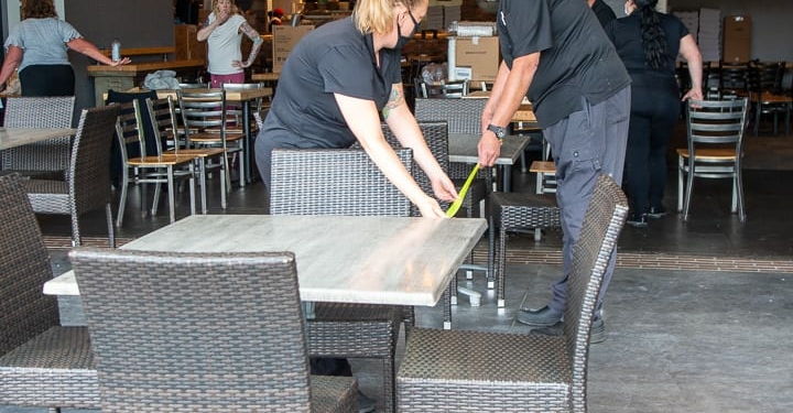 John LaPosta, owner of Innovo Kitchen in Latham, makes sure his tables are six feet apart in response to Gov. Andrew Cuomo allowing restaurants to offer outdoor dining while maintaining 6 feet of social distance (Jim Franco/Spotlight News)