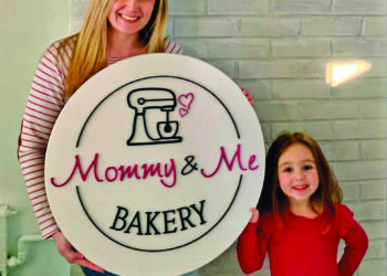 Devin and Mia Villa, the Mommy and the Me represented in this sign, is opening their own bakery. Mia had made news for herself for baking cookies.

Photos by Devin Vil