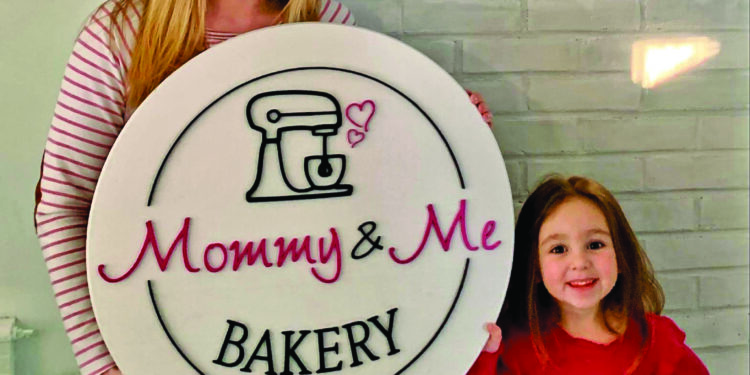 Devin and Mia Villa, the Mommy and the Me represented in this sign, is opening their own bakery. Mia had made news for herself for baking cookies.

Photos by Devin Vil