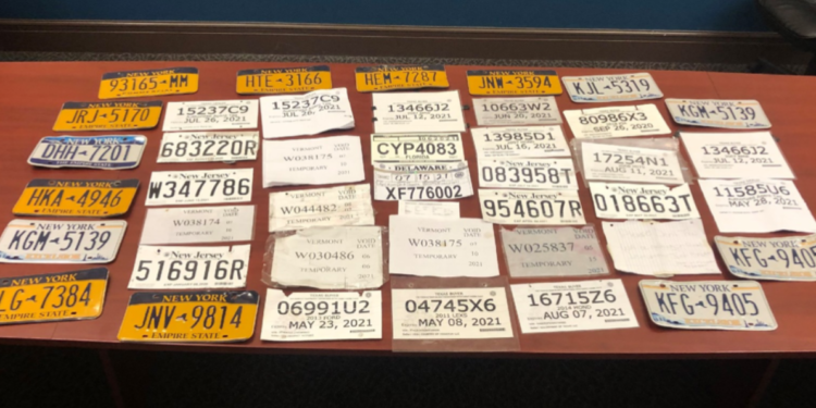Photo of confiscated fake license plates from the Sheriff's Department