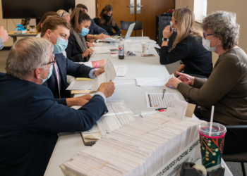 Officials, candidates and attorneys count Colonie absentee ballots at the Albany County Board of Elections on Tuesday, Nov. 9. (Jim Franco / Spotlight News)