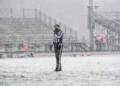 A football referee tries to stay warm durig a pop up snow storm during a game between CBA and Shenendehowa in 2021.
Jim Franco / Spotlight News