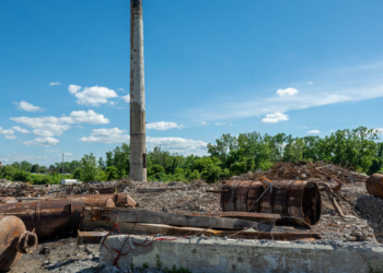 The 200-foot smokestack is the last thing standing at Tobin's. (Jim Franco/Spotlight News)