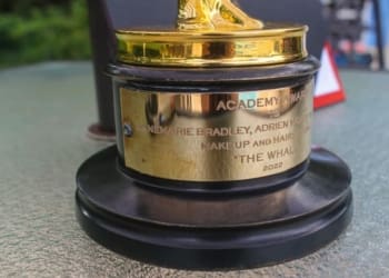 Close up of Annemarie Bradley and Adrien Morot's name on the Academy Award that they won for "Makeup and Hairstyling" for the film, "The Whale" at her Clifton Park residence, Friday, Aug. 25,2023.