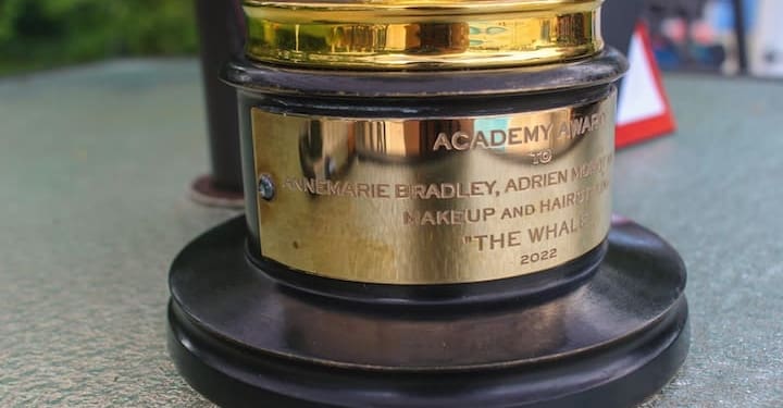 Close up of Annemarie Bradley and Adrien Morot's name on the Academy Award that they won for "Makeup and Hairstyling" for the film, "The Whale" at her Clifton Park residence, Friday, Aug. 25,2023.