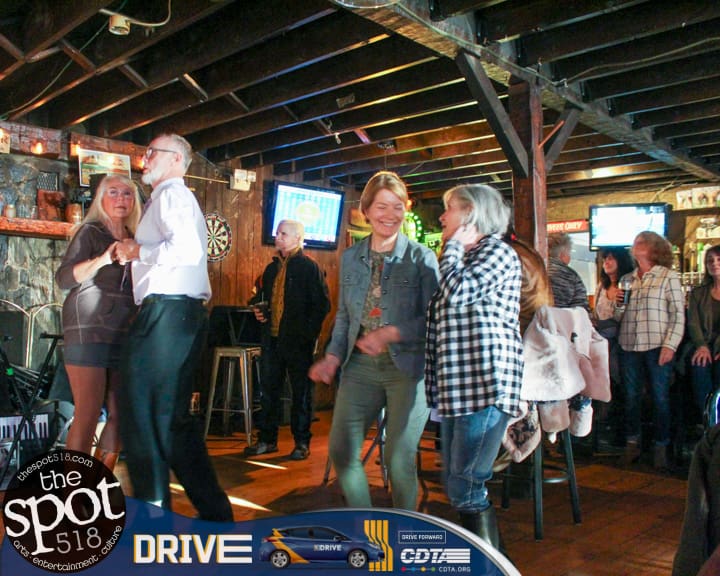 People dancing to Off The Record during Foodstock 10 held at Rustic Barn Pub in Troy, NY, Sunday, November 5, 2023.