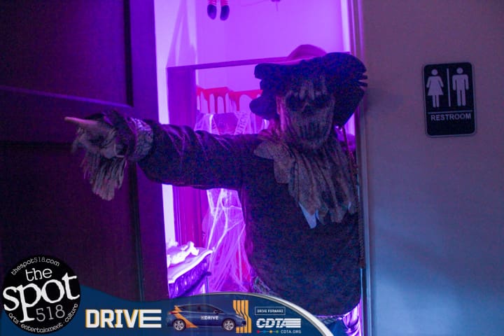A scarecrow scaring guests out of the Lark Hall bathroom on Monday, October 30, 2023.