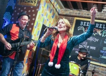 Diva and the Dirty Boys performing at Brown's Brewing Company as part of the 41st Annual Troy Victorian Stroll held on Sunday, December 3, 2023.