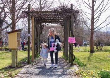 Families and children taking part in an Easter Egg Hunt and Easter-related activities at Ten Broeck Mansion Friday, March 29.